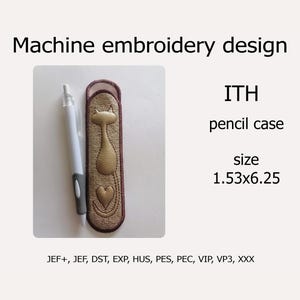 May include: Machine embroidery design for an ITH pencil case featuring a gold cat with a heart. The design is 1.53 inches by 6.25 inches. The design is available in JEF+, JEF, DST, EXP, HUS, PES, PEC, VIP, VP3, and XXX formats.