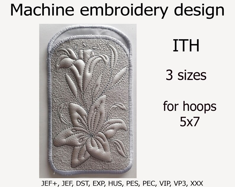 K&ouml;nnte beinhalten: Ein silbernes Maschinenstickdesign mit zwei Lilien in einem 5x7-Rahmen. Das Design ist in drei Gr&ouml;&szlig;en und in folgenden Formaten erh&auml;ltlich: JEF+, JEF, DST, EXP, HUS, PES, PEC, VIP, VP3, XXX.