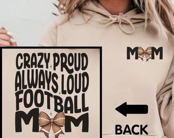 May include: A tan hoodie with the text "Crazy Proud Always Loud Football Mom" on the front and "Mom" with a football bow on the back.