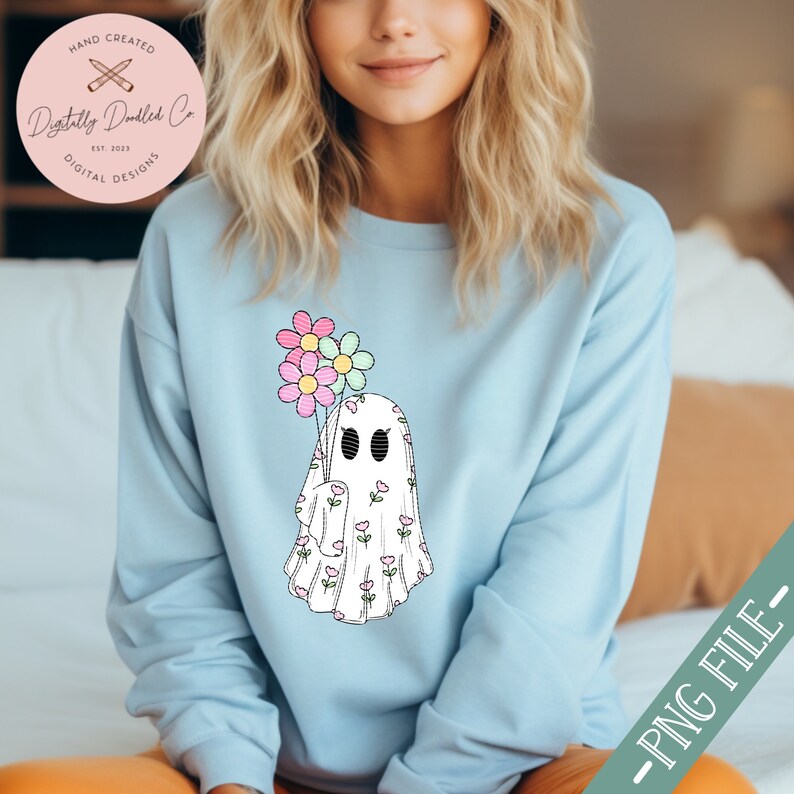 May include: A white ghost with a floral pattern holding a bouquet of pink, blue, and green flowers. The ghost has black eyes and a small mouth. The ghost is on a light blue background.