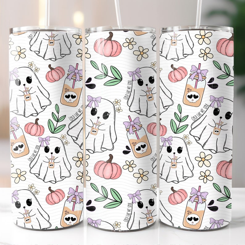 May include: White tumbler with a Halloween themed design featuring ghosts, pumpkins, and jars of iced tea. The text "Cold Like My Soul" is repeated throughout the design.