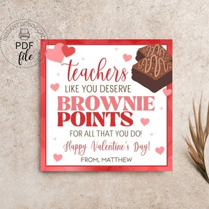 May include: A Valentine's Day printable featuring a red border and the text "teachers like you deserve brownie points for all that you do!" with a brownie graphic and hearts. Includes "Happy Valentine's Day!" and "From, Matthew."