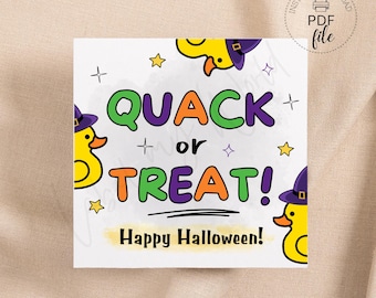 May include: A white printable Halloween sign with a yellow rubber duck wearing a witch's hat. The sign says "Quack or Treat! Happy Halloween!" in colorful letters.