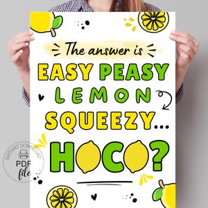 Puede incluir: Un póster blanco con el texto "The answer is EASY PEASY LEMON SQUEEZY... HOCO?" en amarillo y verde. El póster tiene ilustraciones de limones y un icono de archivo PDF.