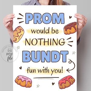 May include: A white printable sign with the text "Prom would be nothing bundt fun with you!" and illustrations of bundt cakes with pink, white, and brown frosting.