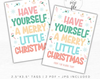 May include: Two printable 2.5" x 3.5" gift tags with a white background and colorful text that reads "Have Yourself a Merry Little Christmas". The tags are decorated with snowflakes, candy canes, and other festive elements. The second tag includes the text "From the School Team".