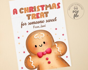 May include: A Christmas-themed card with a gingerbread man illustration. The card reads "A Christmas Treat for someone sweet" and includes the text "From, Jami". The gingerbread man has a pink bow tie and is surrounded by stars.