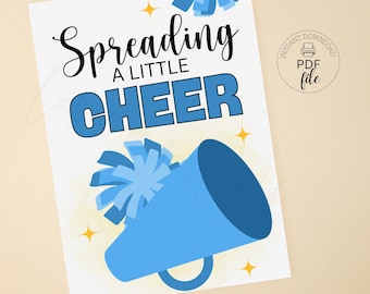 May include: Printable sign with a blue megaphone and cheerleading pom poms. The text reads "Spreading a little cheer".
