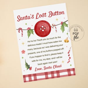 May include: A printable Christmas-themed card with the text "Santa's Lost Button." The card features a large red button, holly, candy canes, and the message from Santa. The bottom has a red and white checkered pattern.