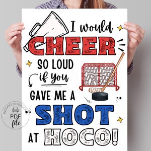 Puede incluir: Un póster con el texto "I would CHEER so loud if you GAVE ME A SHOT AT HOCO!" en rojo y azul. El diseño incluye un megáfono, una red de hockey, un disco y un palo de hockey. El póster es un archivo PDF.
