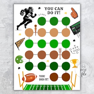 May include: A white printable football-themed game board with a grid of circles in green and brown. The board includes football graphics, a football player, and the text "YOU CAN DO IT!" and "YOU DID IT!"