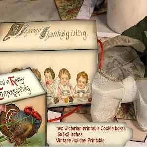 May include: Two vintage-style cookie boxes with Thanksgiving themes. One box features the text "Happy Thanksgiving" and illustrations of children. The other box has the text "Wishing You a Happy Thanksgiving" with a turkey illustration. The boxes are 5x3x2 inches.