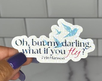 Op de afbeelding: Witte sticker met een blauw glitterontwerp van twee vliegende vogels. De sticker heeft de tekst "Oh, but my darling, what if you fly? -Erin Hanson"