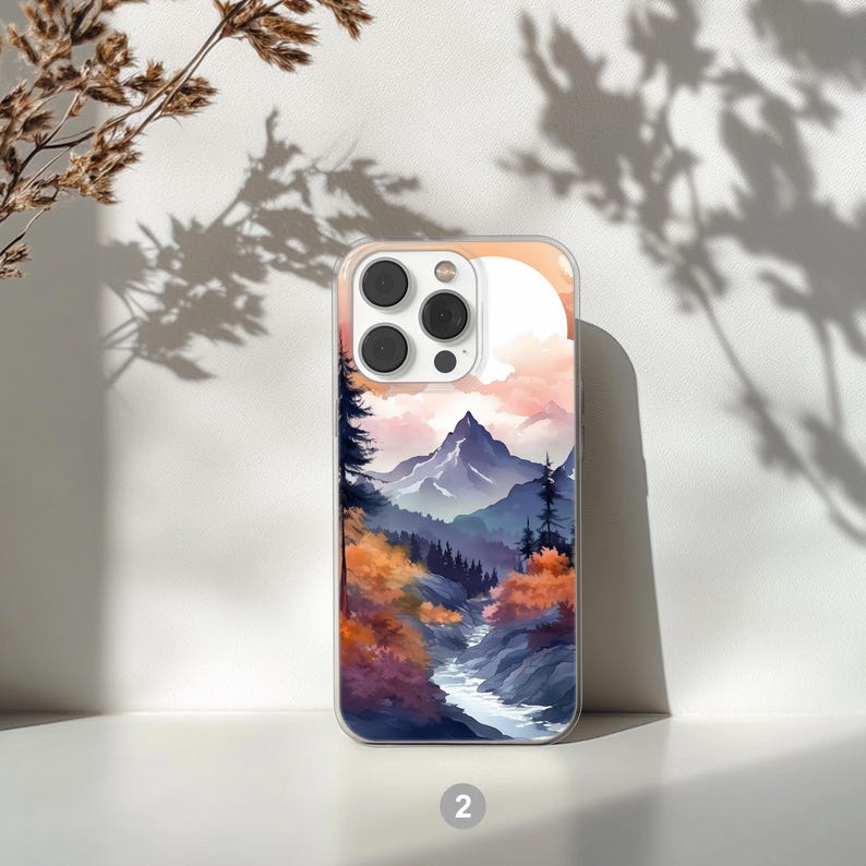 Mountain landscape phone case featuring scenic nature design with peaks, trees, and sky. Aesthetic and protective case for iPhone and Samsung. Ideal for outdoor lovers, hikers, and nature enthusiasts. Durable and stylish phone cover with mountain view artwork, perfect for those who love travel, adventure, and natural beauty.