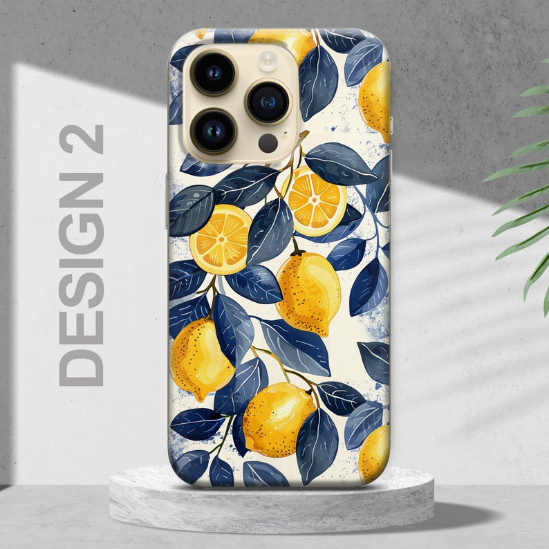 May include: A white iPhone case with a design of lemons and blue leaves. The case has a camera cutout and a white background.