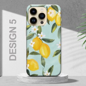 May include: A phone case with a light blue background and a pattern of lemons and white flowers. The case has a camera lens cutout and the text "DESIGN 5" on the left side.