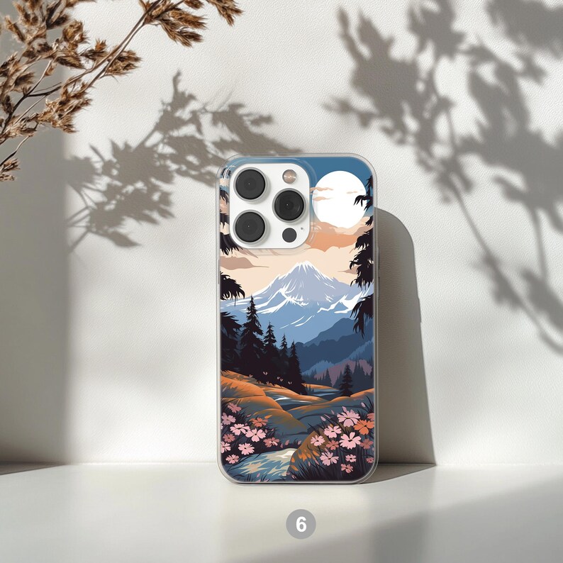 Mountain landscape phone case featuring scenic nature design with peaks, trees, and sky. Aesthetic and protective case for iPhone and Samsung. Ideal for outdoor lovers, hikers, and nature enthusiasts. Durable and stylish phone cover with mountain view artwork, perfect for those who love travel, adventure, and natural beauty.