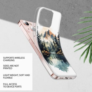 Puede incluir: Una funda transparente para tel&eacute;fono con un dise&ntilde;o de acuarela de una cordillera y un lago. La funda est&aacute; dise&ntilde;ada para admitir la carga inal&aacute;mbrica y tiene acceso completo a los puertos del dispositivo. Los lados de la funda no est&aacute;n impresos.