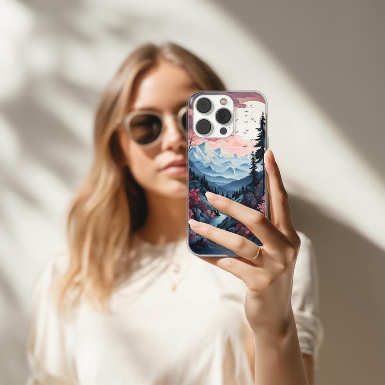 Mountain landscape phone case featuring scenic nature design with peaks, trees, and sky. Aesthetic and protective case for iPhone and Samsung. Ideal for outdoor lovers, hikers, and nature enthusiasts. Durable and stylish phone cover with mountain view artwork, perfect for those who love travel, adventure, and natural beauty.