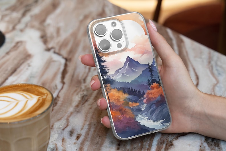 Mountain landscape phone case featuring scenic nature design with peaks, trees, and sky. Aesthetic and protective case for iPhone and Samsung. Ideal for outdoor lovers, hikers, and nature enthusiasts. Durable and stylish phone cover with mountain view artwork, perfect for those who love travel, adventure, and natural beauty.