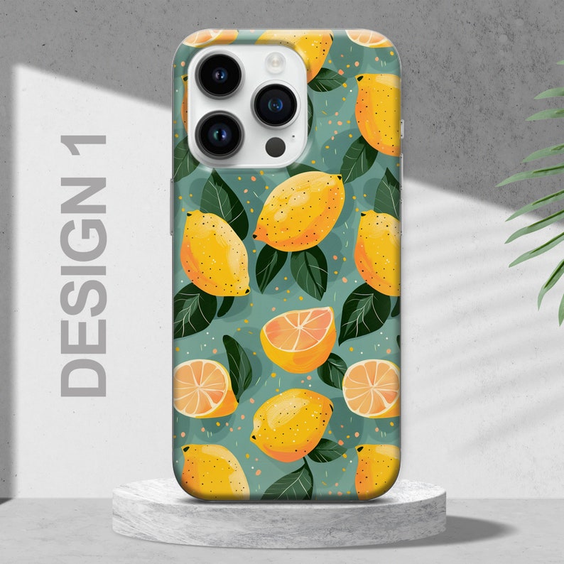 May include: A phone case with a green background and a pattern of yellow lemons. The case has a camera cutout with three lenses.