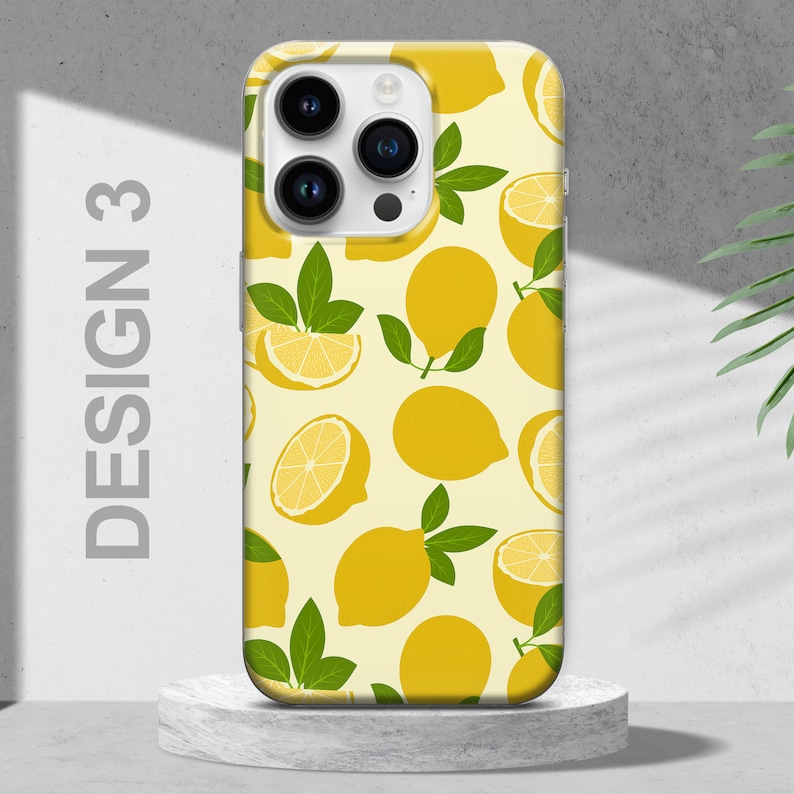 May include: A yellow and green phone case with a lemon pattern. The case has a camera cutout and a white background. The text "DESIGN 3" is visible on the left side of the image.