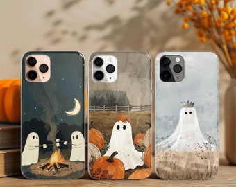 May include: Three phone cases with Halloween-themed designs. One case shows ghosts roasting marshmallows by a campfire under a starry night sky. Another features a ghost in a pumpkin patch. The third depicts a ghost wearing a crown in a field.