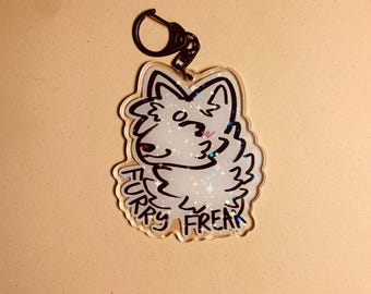 Dumme “Furry Freak” Acryl-Pins und Schlüsselanhänger Vorbestellung