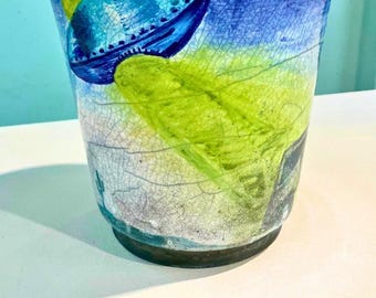 UFO abducting cybertruck in desert landscape wheel thrown raku pot (glows in the dark!)