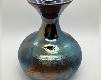 Dramatic black Raku bottle vase