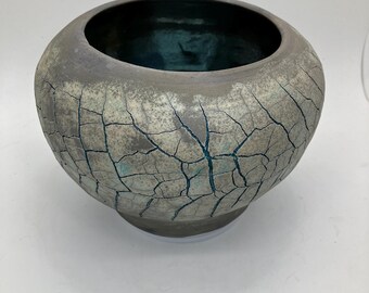 Raku fired thrown crackle clay vase