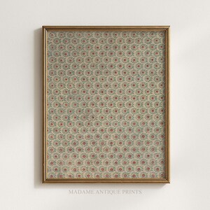 May include: A framed print featuring a repeating pattern of small, stylized flowers in red and teal on a beige background. The print is in a gold-colored frame, with the text "MADAME ANTIQUE PRINTS" at the bottom.