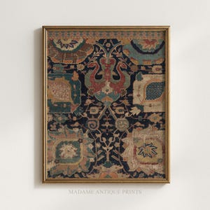 May include: Framed vintage textile print with a dark blue background and intricate patterns in red, teal, and gold. The print features floral and geometric designs, with the text "MADAME ANTIQUE PRINTS" at the bottom.
