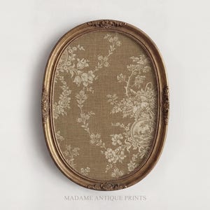 May include: An oval, gold-colored framed print with a floral design on a tan background. The frame has ornate detailing. The print features a repeating pattern of flowers and foliage. The text "MADAME ANTIQUE PRINTS" is at the bottom.