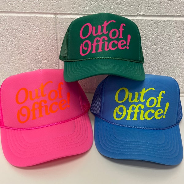 May include: Three trucker hats with the text "Out of Office!" in different colors. The hats are green, pink, and blue. The text is in a retro font style.