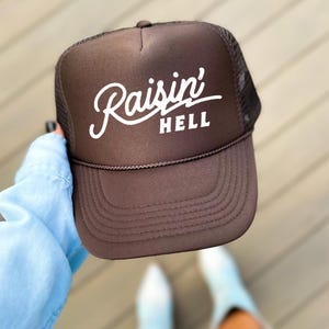 Raisin Hell Trucker Hat | Multiple Color Options