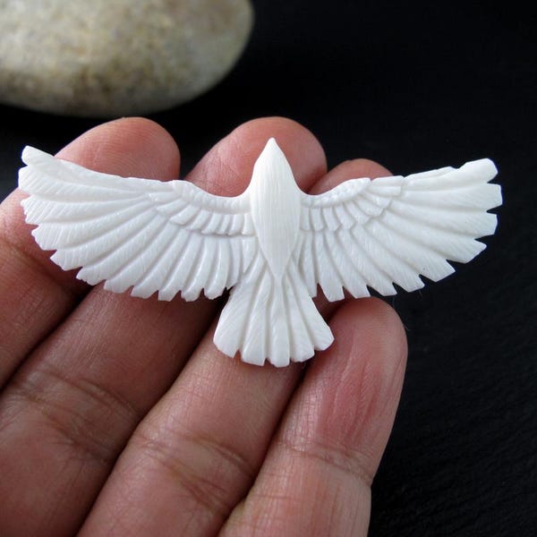 Carved Buffalo  Bone Raven , message me if you need drilling