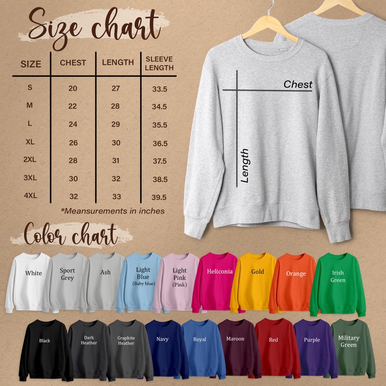 Puede incluir: Una sudadera gris claro en una percha, con una tabla de tallas y una tabla de colores. La tabla de tallas muestra las medidas de pecho, largo y largo de manga en pulgadas. La tabla de colores muestra varios colores de sudadera, incluyendo blanco, negro y azul marino.