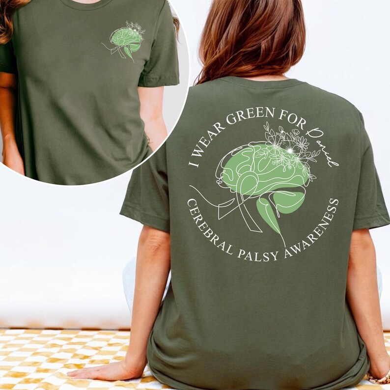 I Wear Green cerebral palsy support shirt with green brain artwork and awareness message. Cerebral palsy awareness tee created for CP warriors, survivors, caregivers, and supporters to promote understanding and visibility during awareness events or daily wear.