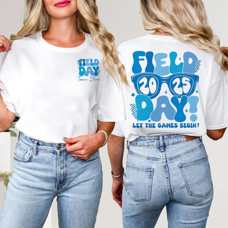May include: White t-shirt with blue text that says "Field Day" and "Team Blue" on the front. The back of the shirt has blue text that says "Field Day" with a pair of blue sunglasses with the numbers 20 and 25 on the lenses. The text "Let the Games Begin!" is below the sunglasses.