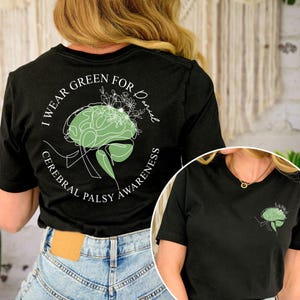 CP awareness shirt designed with green awareness theme, brain illustration, and meaningful message. Ideal cerebral palsy support apparel for families, advocates, and supporters, promoting awareness, strength, and compassion through wearable design.