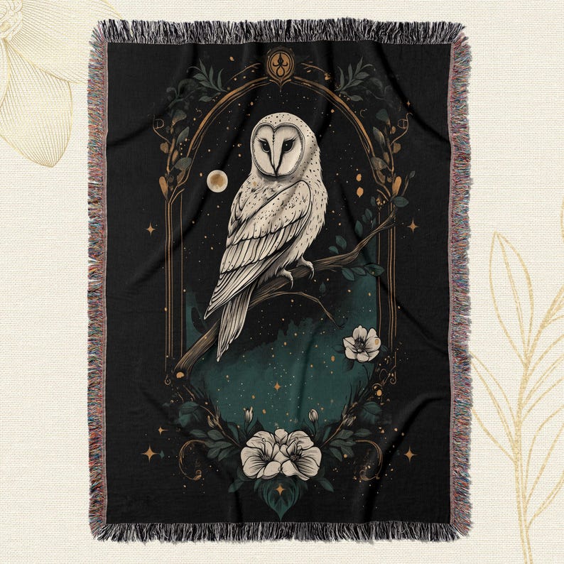 May include: A black tapestry with a white owl perched on a branch with flowers and a moon in the background. The owl is surrounded by a gold frame with a star design.