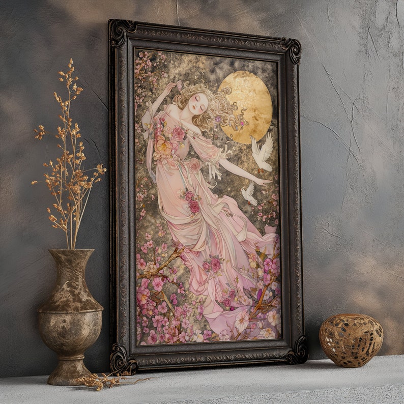 May include: A framed illustration of a woman with long flowing hair, wearing a pink dress and surrounded by pink flowers. She is floating in the air with doves flying around her. The background is a soft, muted gray.