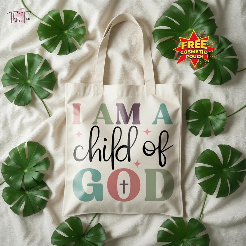 May include: A cream-colored tote bag with the text "I AM A child of GOD" in colorful letters. The bag has a cross symbol and is surrounded by green leaves. A free cosmetic pouch is also included.