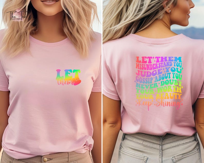 May include: Pink t-shirt with a rainbow graphic that says "Let them" on the front and "Let them misunderstand you, judge you, gossip about you, never doubt your worth, your beauty, keep shining." on the back.