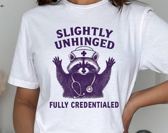 Funny Raccoon Nurse TShirt, Feral Nurse Shirt, Slightly Unhinged Fully Credentialed Tee,Funny Nurse Shirt,Gift For Nurse,Nurse Life Crewneck