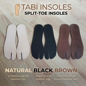 May include: Three pairs of split-toe Tabi insoles in natural, black, and brown leather. The natural pair is undyed veg-tan, the black pair has a matte finish, and the brown pair is hand-finished. Each insole features a perforated edge.