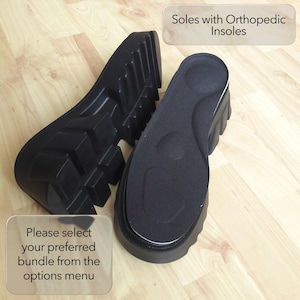May include: Black orthopedic insoles with a textured design. The insoles are shown with the text "Soles with Orthopedic Insoles". The image also includes the text "Please select your preferred bundle from the options menu".