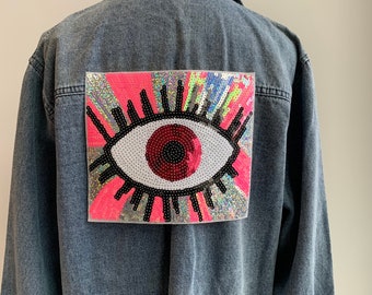 Großer funkelnder Pailletten Aufnäher in Pink auf Evil Eye