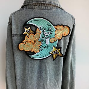 Moon Face Embroidered Iron On Patch – Light Blue Crescent Moon with Eyes, Gold Cloud & Stars – Celestial Applique for Jackets, Bags, Witchco